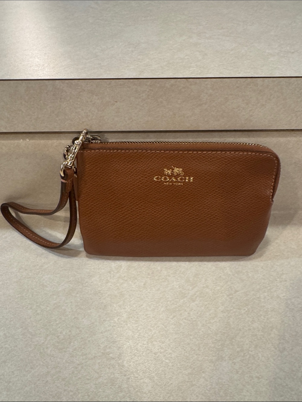 Coach Brown Pebbled Leather Wristlet with Gold Logo